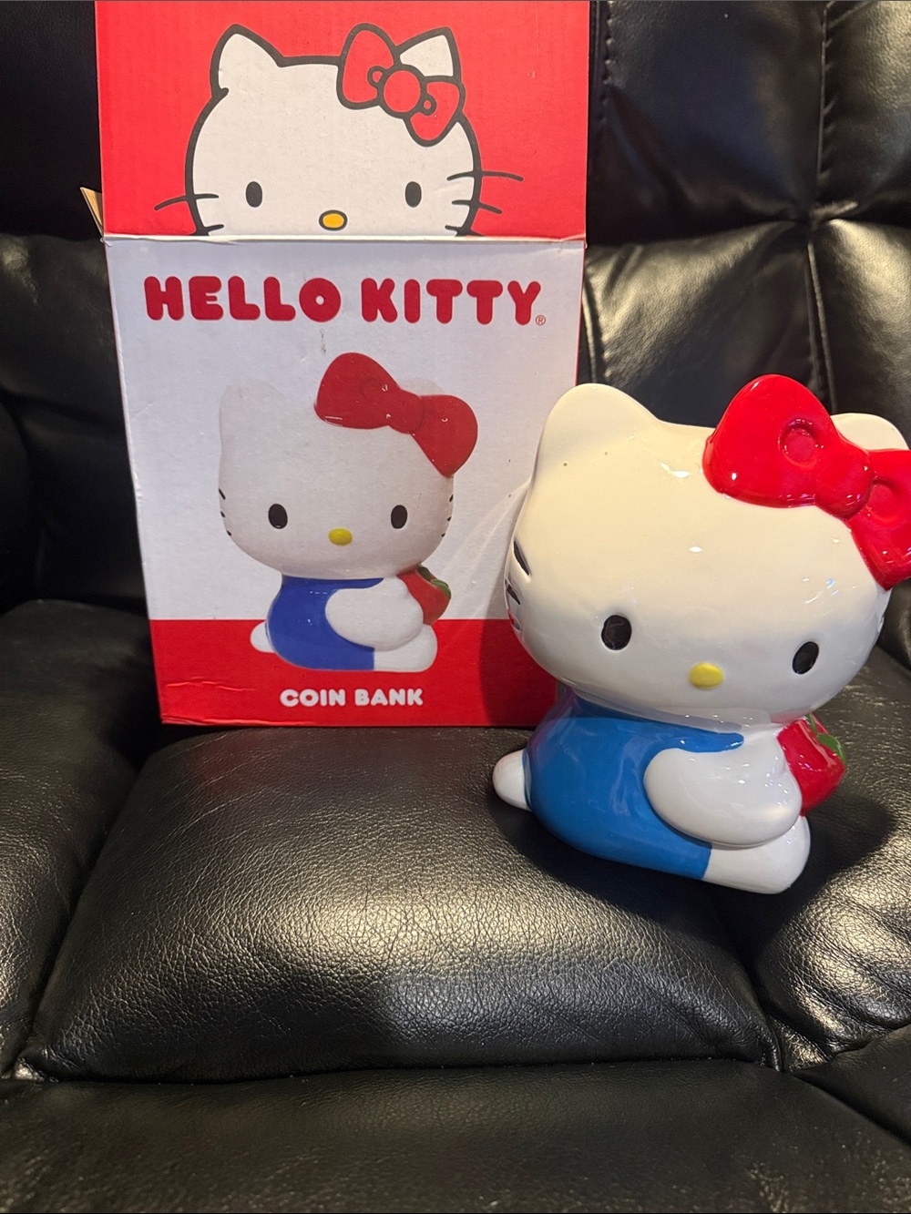 Sanrio Hello Kitty Blue Outfit Ceramic Coin Bank with Red Bow